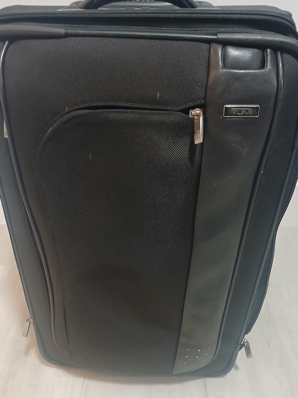 Tumi Black Softside Carry-On with Front Pockets